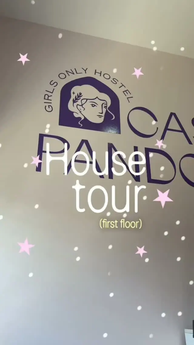 Cover of the Instagram reel “House tour (first floor)”: the violet Casa Pandora logo on the lounge wall with pink stars