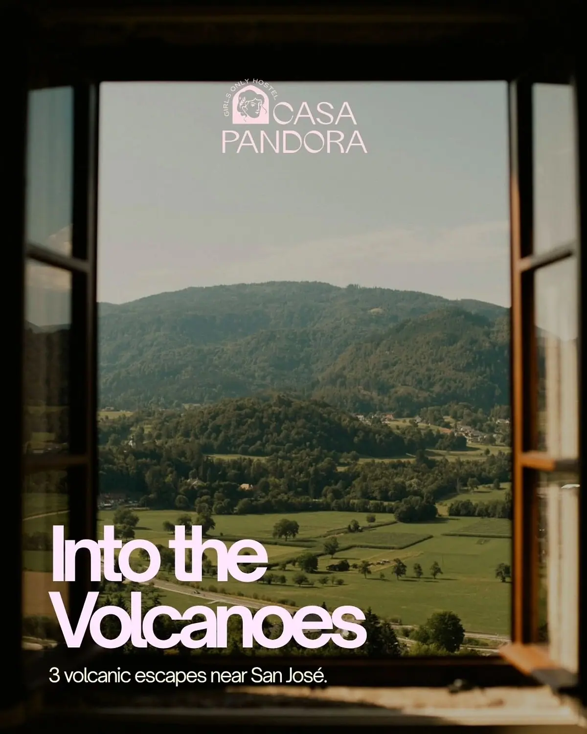 Cover of the Instagram guide “Into the Volcanoes”: green volcanic hills seen through an open window